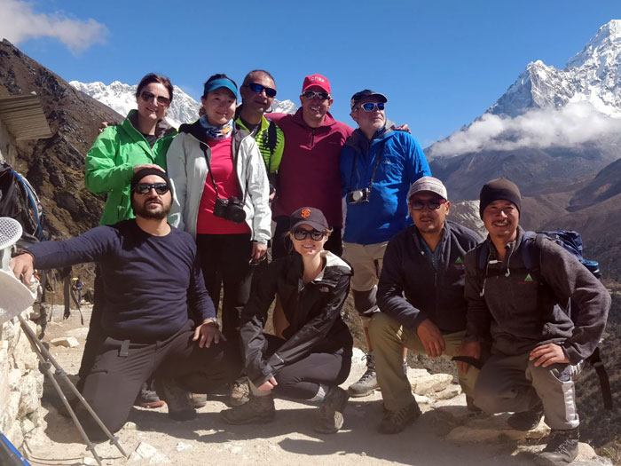members with mountain backgroud